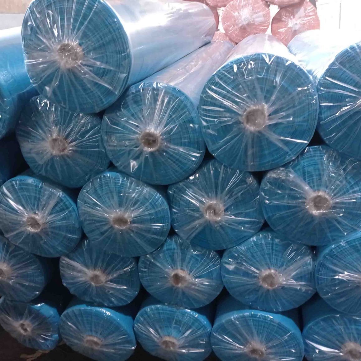 Tintes Alzira, S.A.L. rollos de tela azul